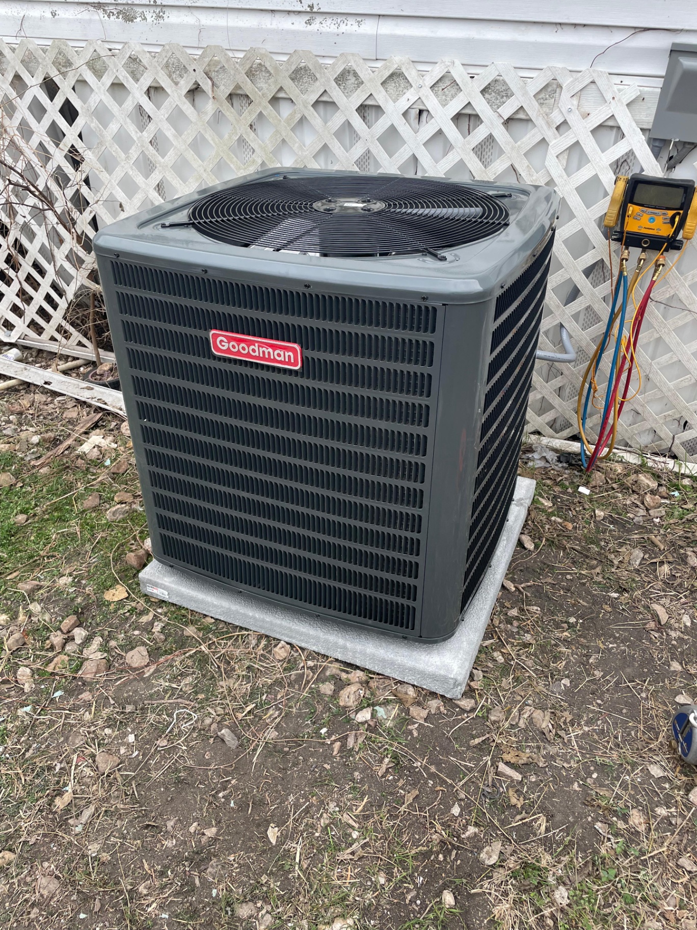 Goodman AC condenser installed on concrete pad by a TrueLocalPros verified HVAC pro