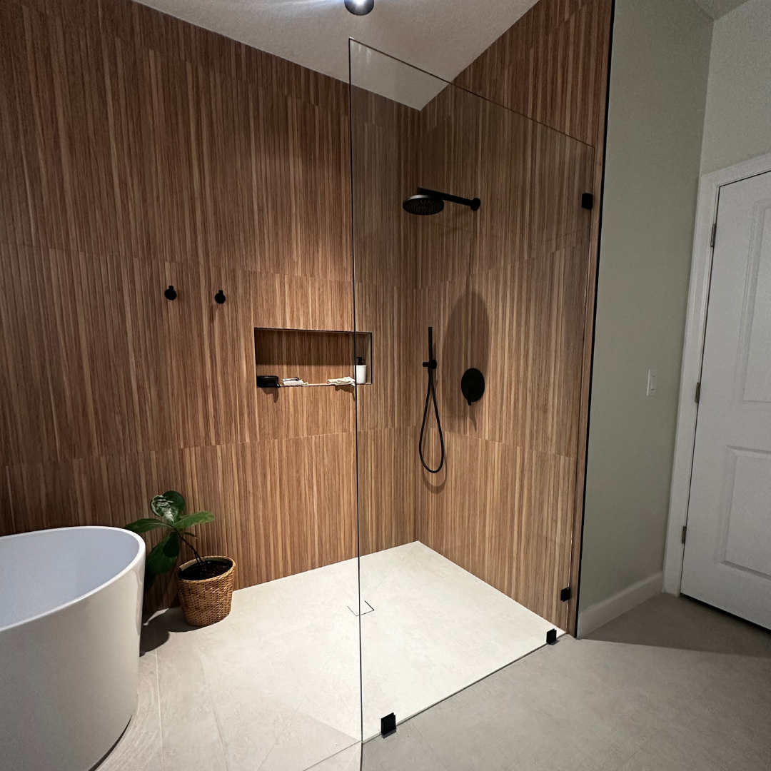 Modern remodeled bathroom with walk-in shower and freestanding tub